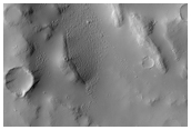 Breach in Channel Along Apollineris Patera Caldera