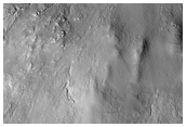 Putative Olivine-Rich Crater Ejecta