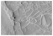 Irregular Structures in Huo Hsing Vallis
