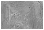 Layered Deposits in Impact Crater in Utopia Planitia