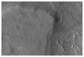 Purported New Dark Spot Impact Crater