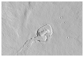Low Shield with Elongate Summit Depression in North Tharsis Region 