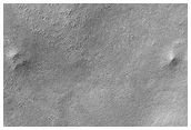 Observe Seasonal Defrosting of Tiny Crater 