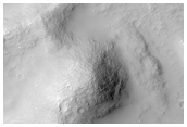 Possible Deposit Associated with Madim Vallis 