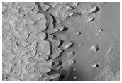 Layered Deposit in a Small Crater within Schiaparelli Crater