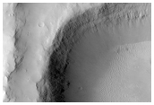 Crater Ejecta Wrapped Around Raised Rim of Smaller Crater 