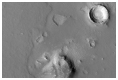 Dark Spot/Depression in the Phlegra Region 