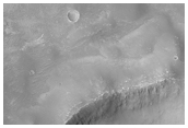 Light-Toned Layering in Plains South of Melas Chasma 