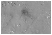 New Dark Spot Impact Crater 