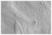 Layered Deposits within an Impact Crater in Utopia Planitia 