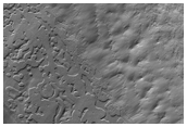 Exposure of Polar Layered Deposits Not Observed Previously 