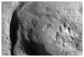 Impact Crater Cutting Wrinkle Ridge in Eastern Tempe Terra 