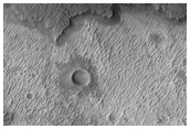 Relatively Dust Free Lavas from Arsia Mons