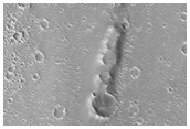 Chain of Cratered Cones Near Hephaestus Fossae