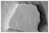 Mesa and Pits on Crater Floor