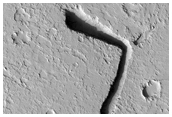 Channels Emanating from Fissure West of Olympus Mons Aureole
