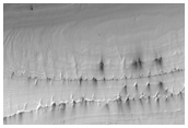 Reynolds Crater Rim Layering - Unusual 