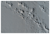 New Dark Spot Impact Crater