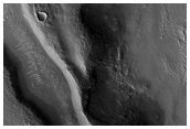 Possible Collapsed Slab Along Walls of Mamers Vallis