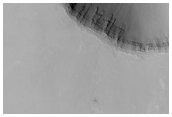 Search For Light-Toned Layering in Plains