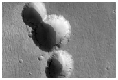 Pit Crater Chain Cutting Lava Flow in Southwest Alba Patera