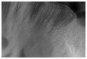 Gullies in Crater in South Aonia Terra 