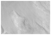 Steamlined Landforms in Western Charitum Montes