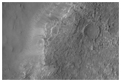 Odd Layered and Eroding Crater Fill in Deeply Eroded Craters