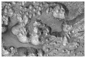 Light-Toned Layers in Crater South of Crommelin Crater