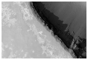 Search For Light-Toned Layering in Plains of Ius Chasma