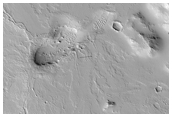 Low Shield with Radial Flows East of the Olympica Fossae