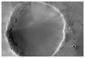 Possible Phyllosilicates in Crater Ejecta