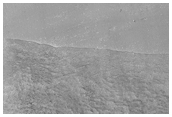 Massif with Debris Apron Near Reull Vallis