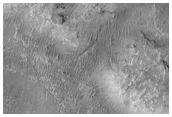 Odd Layered and Eroding Crater Fill in Deeply Eroded Craters