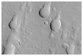 Secondaries on Possible Ash Deposits North of Apollinaris Region