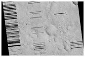 Bright Halo Pits Seen in MOC Image E11-01762