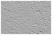Complex Wavy Layering in Polar Layered Deposits
