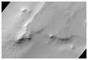 Knobs and Depressions in Malea Planum