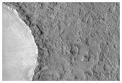 Low Albedo and Medium-High Thermal Inertia