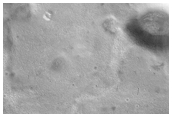 Chain of Small Pits in Southern Aonia Terra