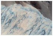 Well-Preserved Unnamed Crater Near Tartarus Region