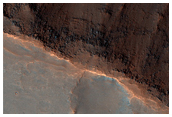 Light-toned Layering along Plains and in Pit floor Next to Juventae Chasma