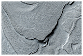 Complex Folded Terrain on the Floor of the Hellas Impact Basin