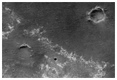 Search for Light-Toned Layering in Ius Plains
