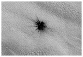 New Impact Crater Formed between March 2000 and July 2003