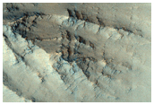 Layering along Oudemans Crater Wall