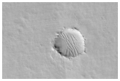 Fresh Rayed Crater in Tharsis Region