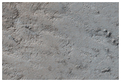 Possible Exposure of Polar Layered Deposits in Area Not Before Well-Imaged