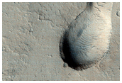 Low Shield with Elongate Summit Caldera East of Olympica Fossae