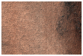 Possible Exposure of Polar Layered Deposits in Area Not Well Observed